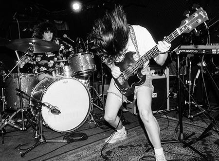 Members of NoBro performing onstage.