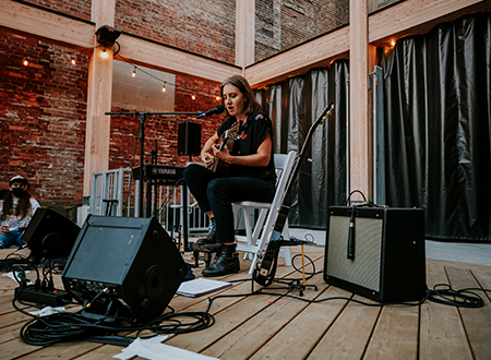 Myrian Gendron performing onstage.