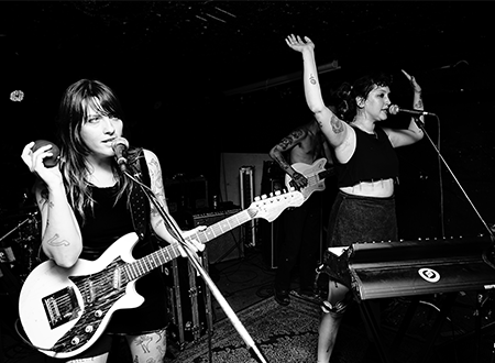 La Sécurité performing onstage.