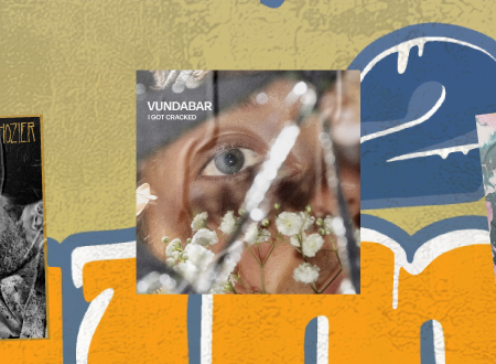 Album art cover for Vundabar single plastered on a beach wall.