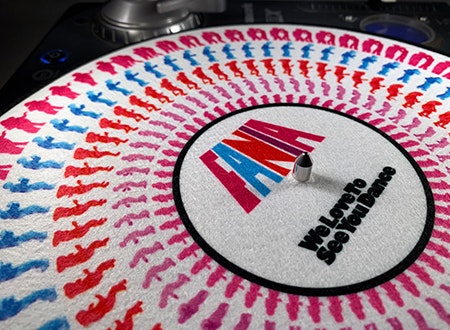 Drew Tetz using a record turntable