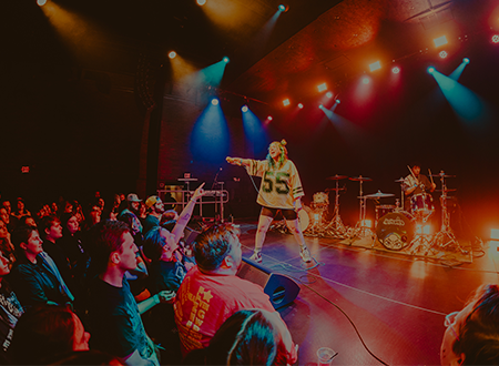 lolitslea performing onstage.