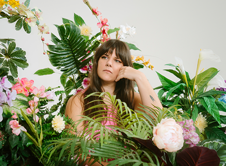 Hannah Glavor in foliage.