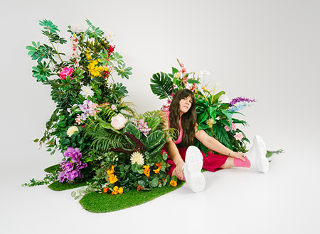 Hannah Glavor in foliage.