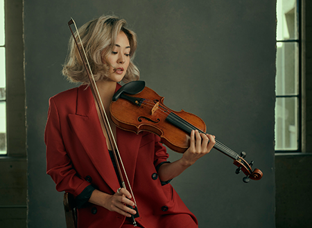 Simone Porter with a violin.
