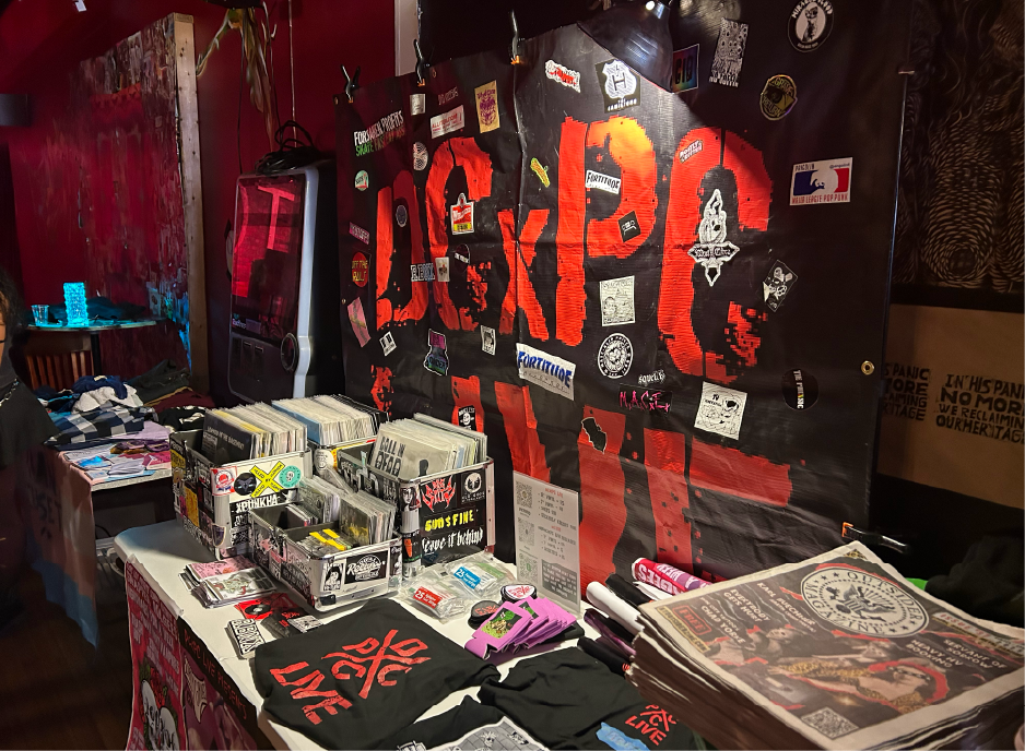 DCxPC merch table at Rally in the Valley.