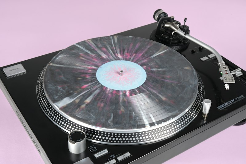 ivycomb Rebirth Black Ice White Mist Blend and pink splatter vinyl.