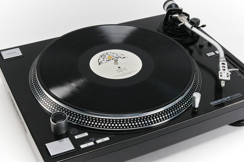 Angine de Poitrine Volume I black vinyl record on a turntable