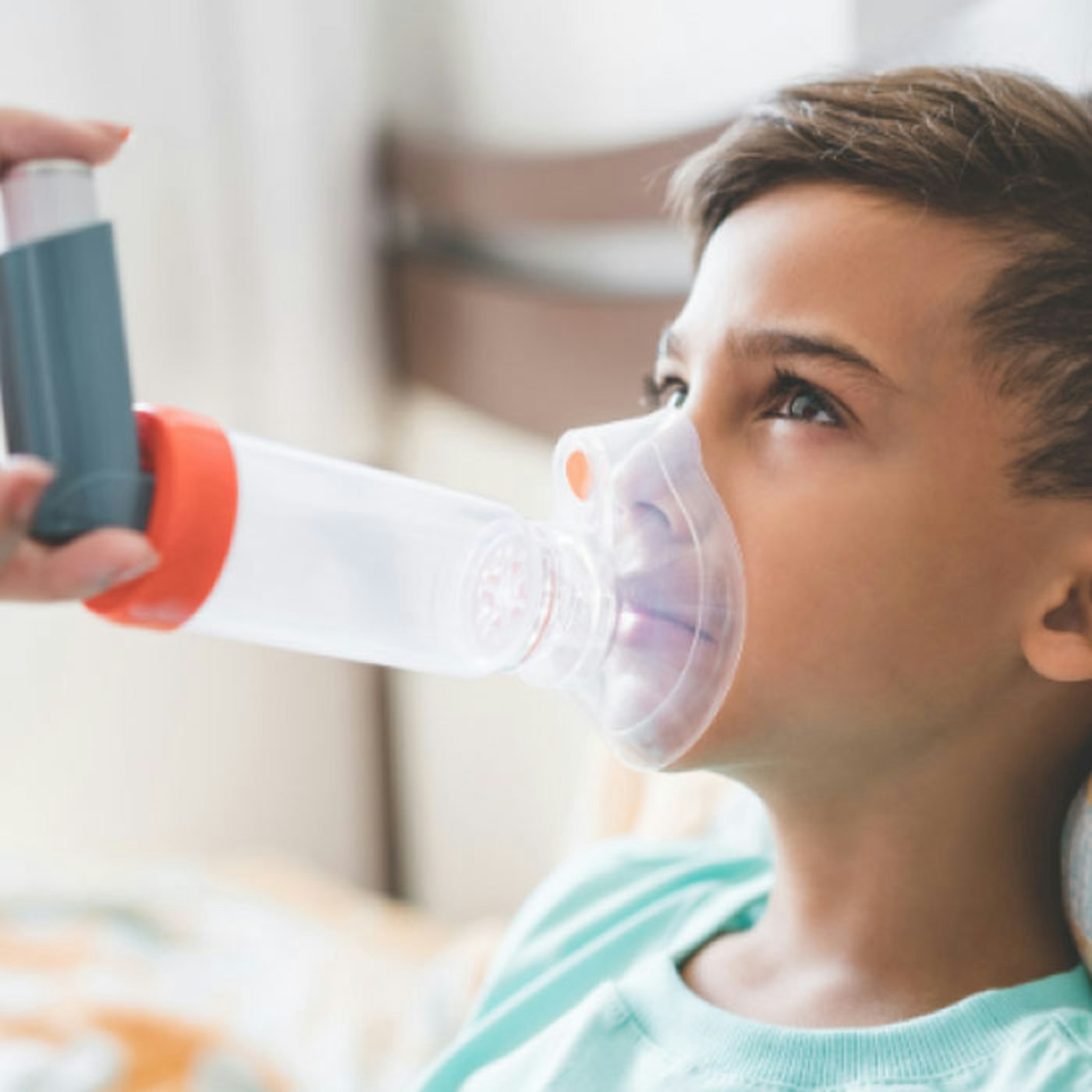 Child receiving asthma treatment