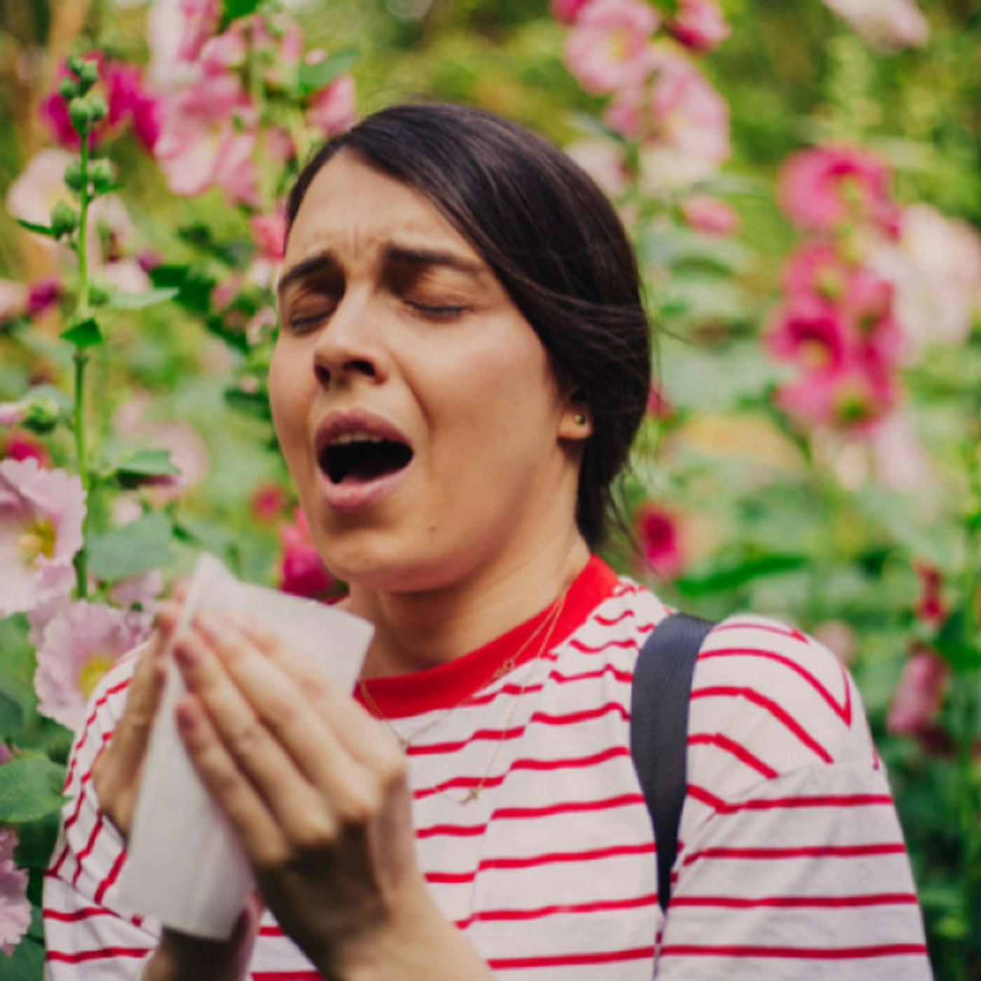 Woman about to sneeze