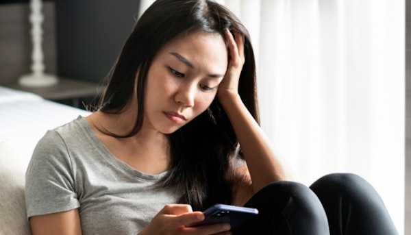 Woman looking at her phone