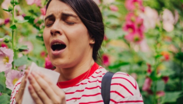 Woman about to sneeze