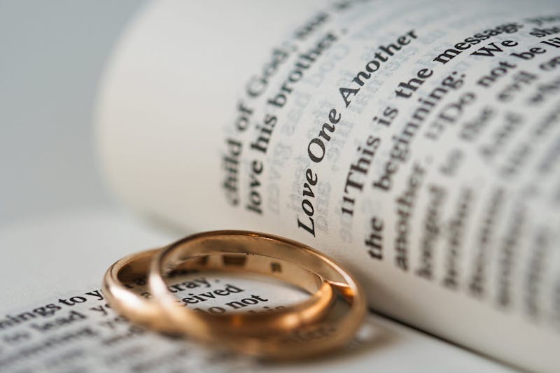 two rings on an open book
