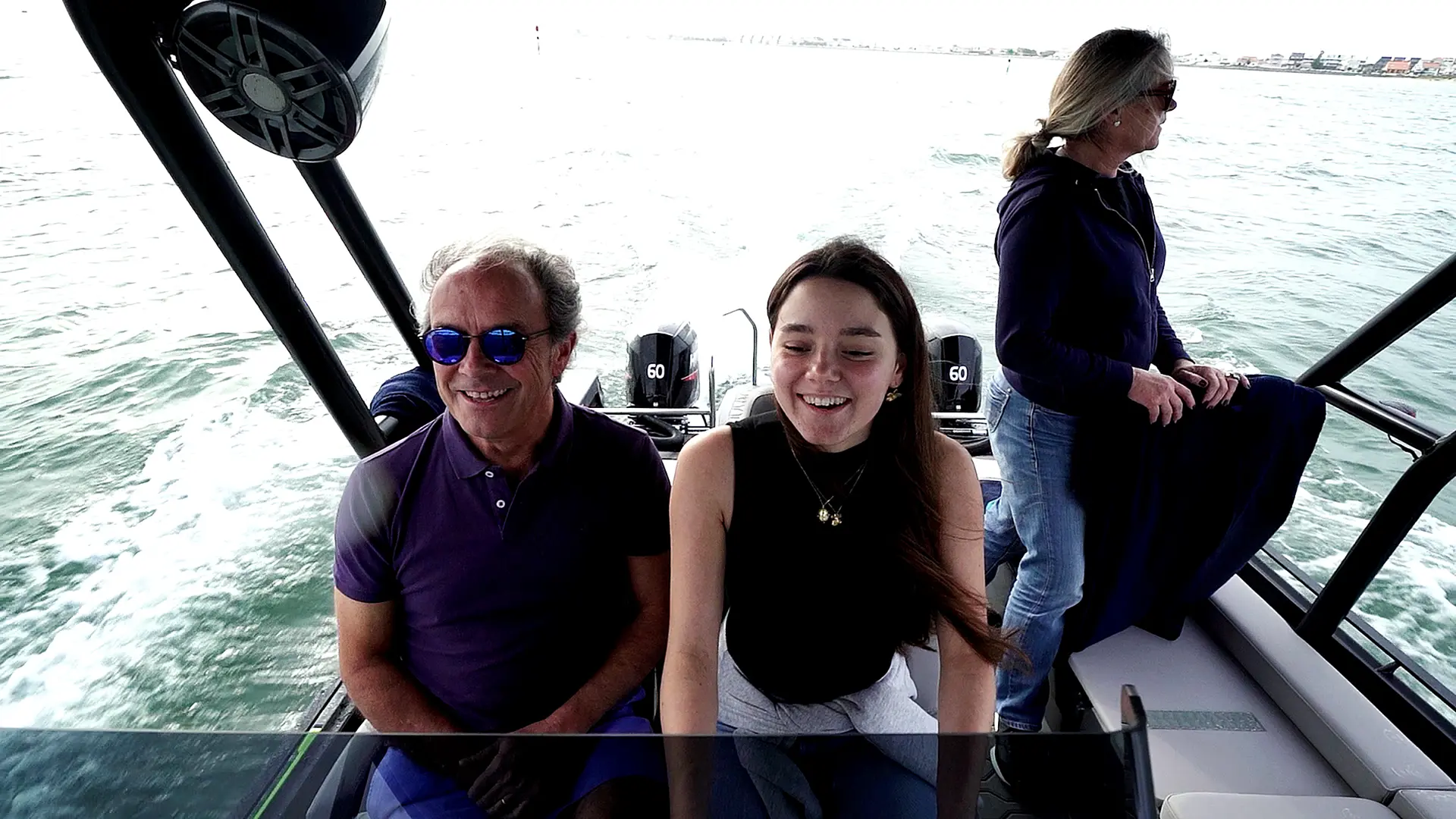Family enjoying a smooth ride on the Korkyra 650 catamaran.