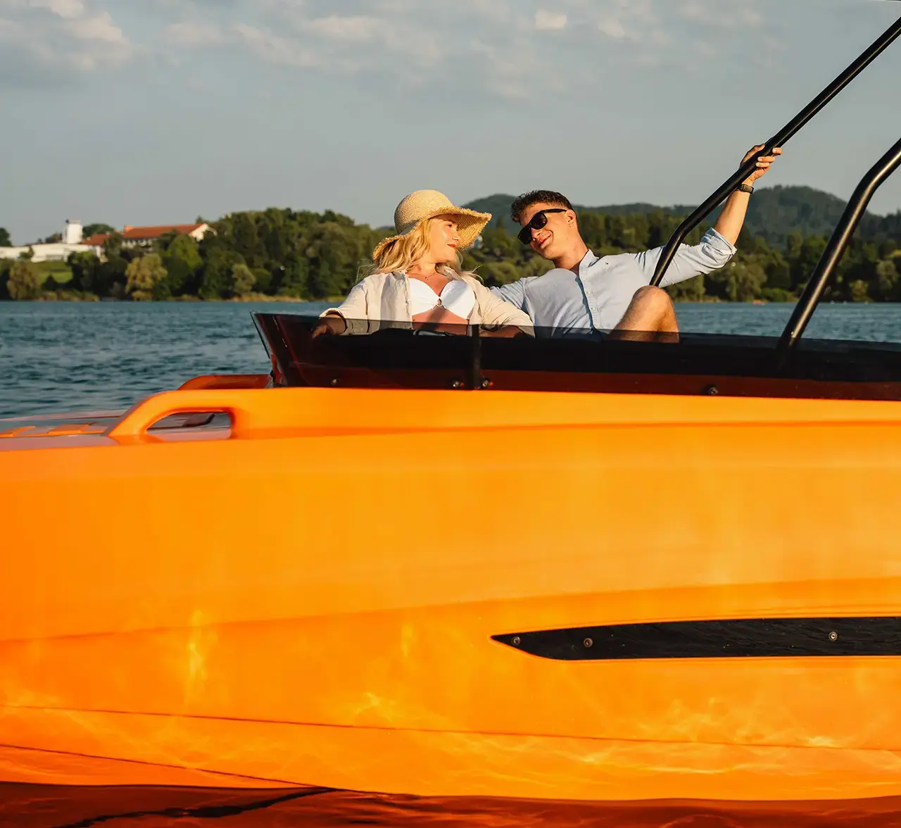 Smiling couple enjoying time aboard the Korkyra 650 boat.