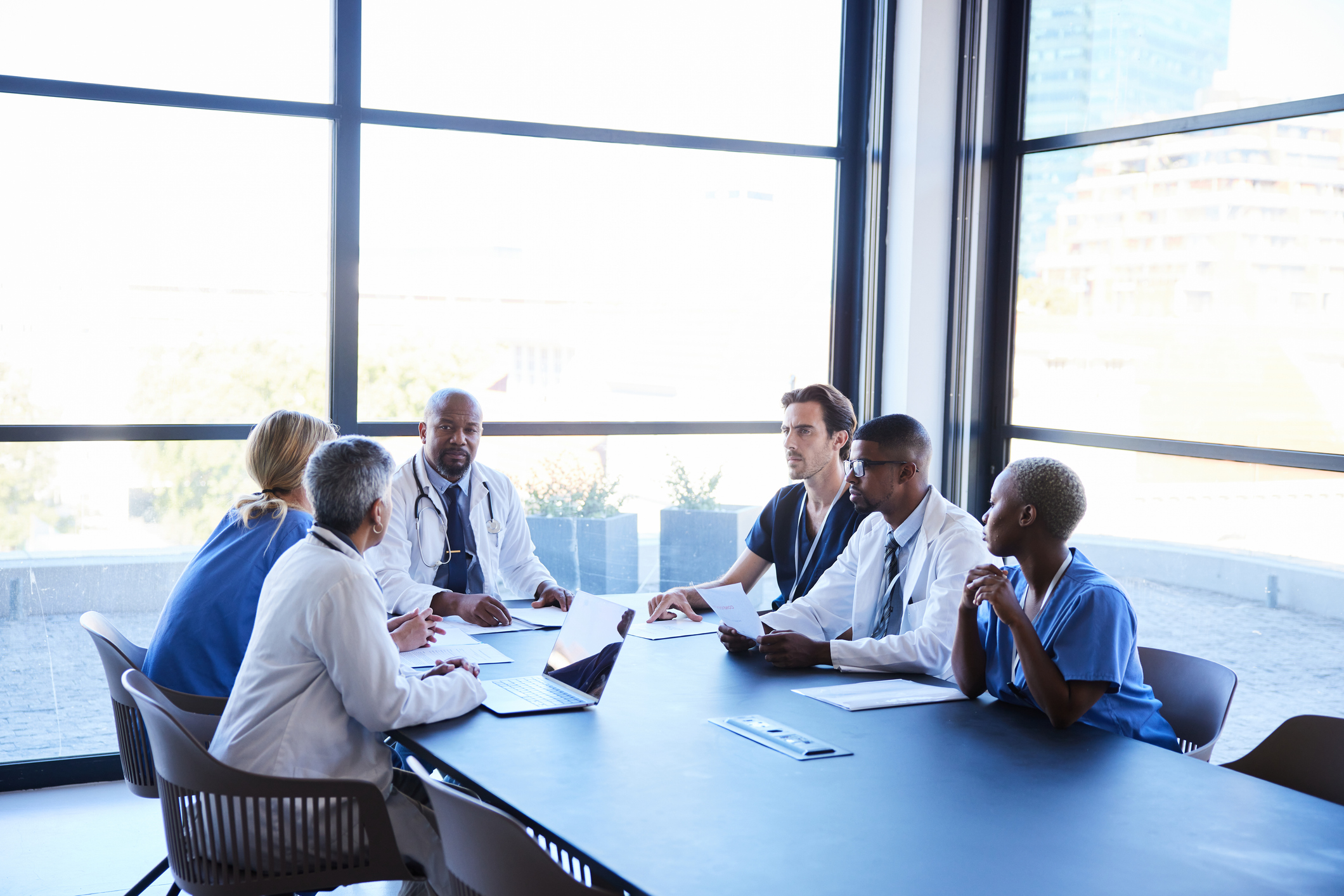 team of it professional consulting about ehr workflows