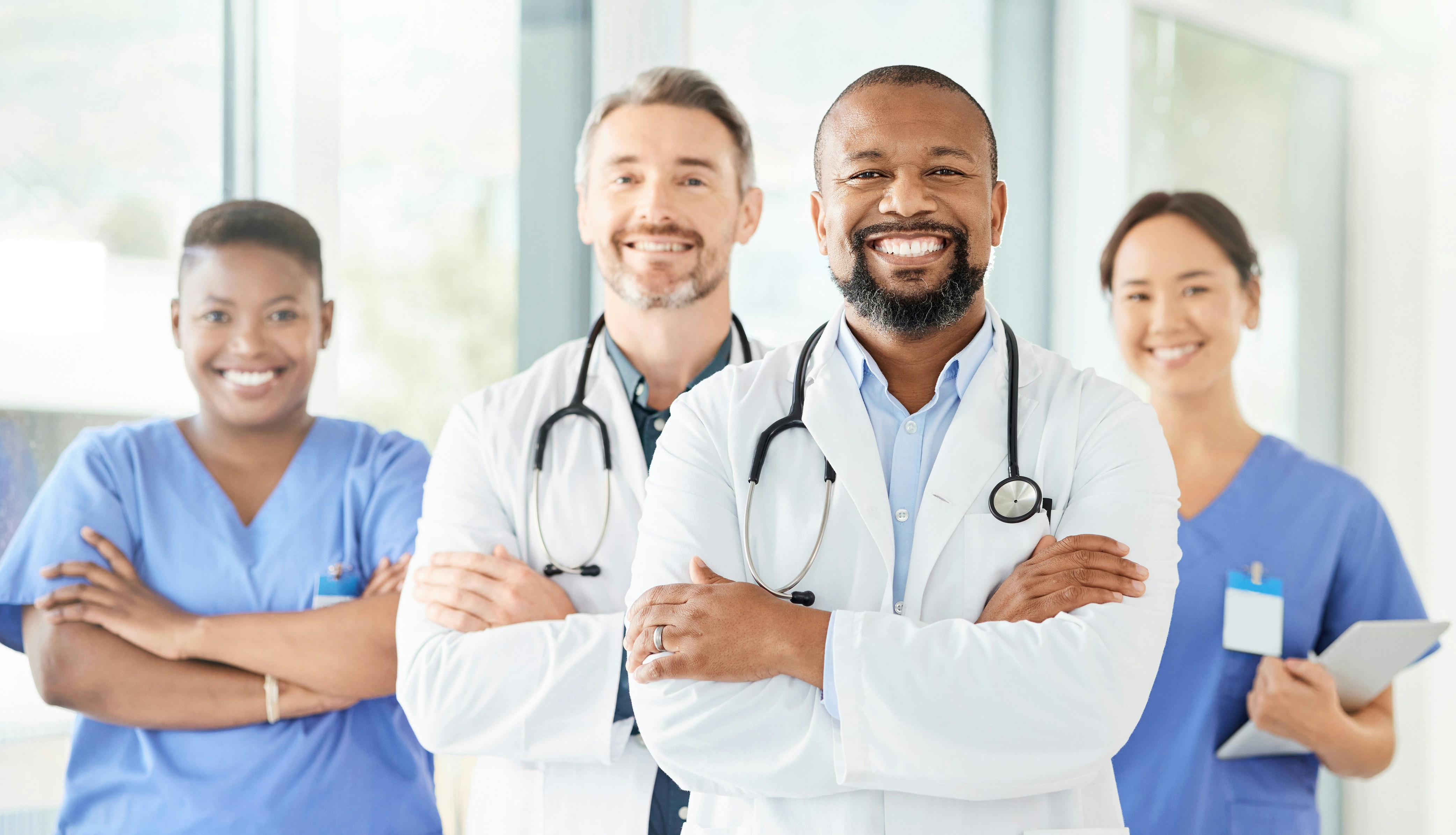 healthcare professionals smiling at the camera