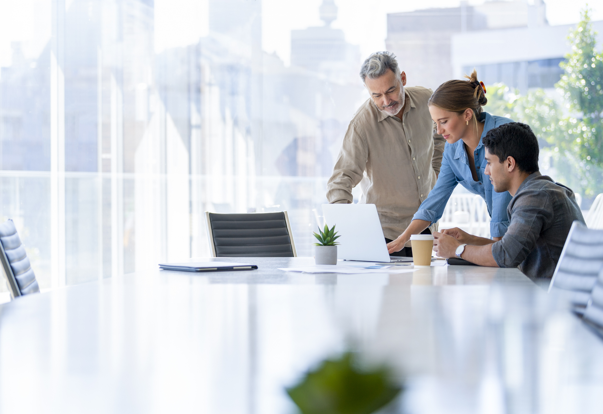 business leaders working on a laptop