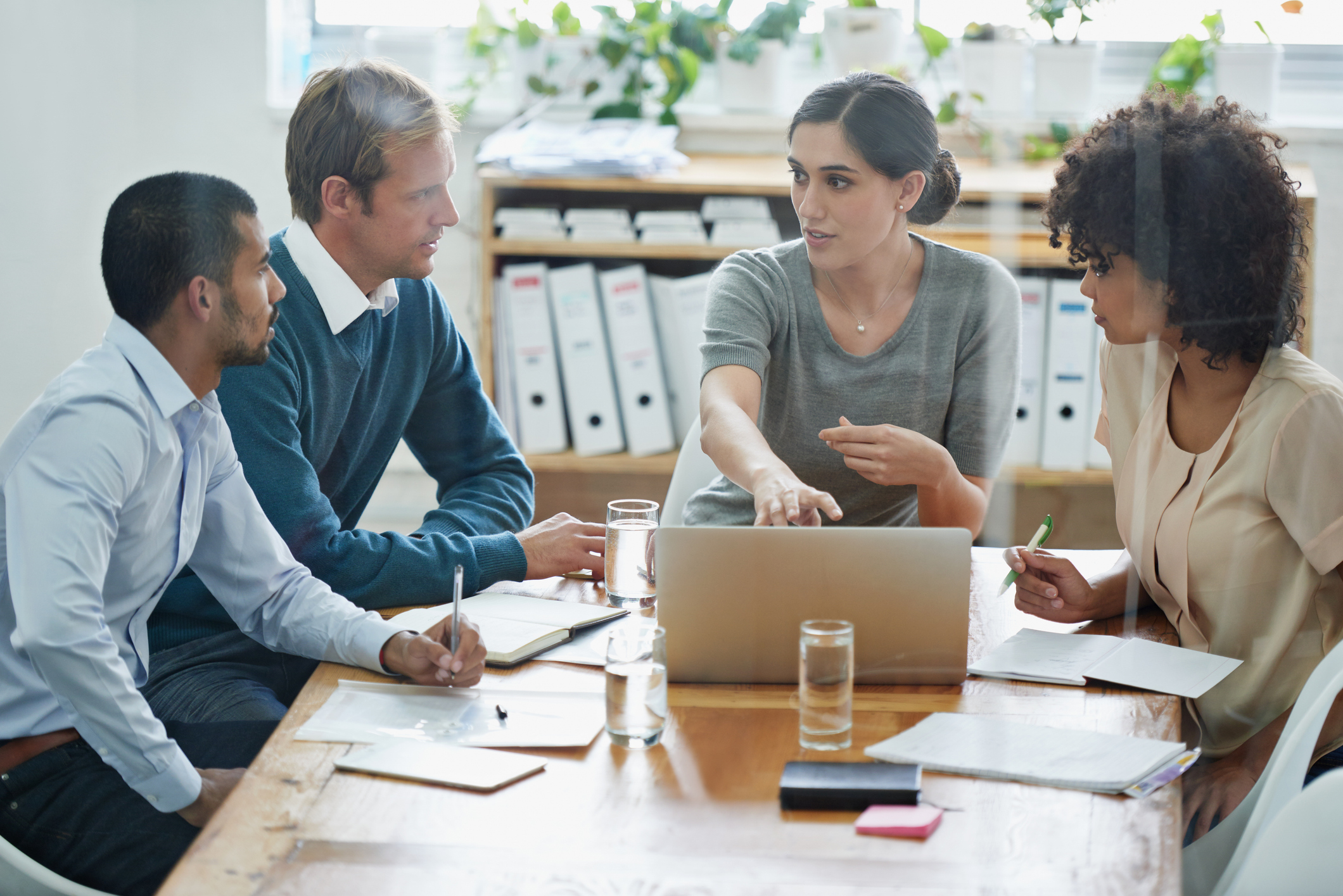 team of employees talking businesses