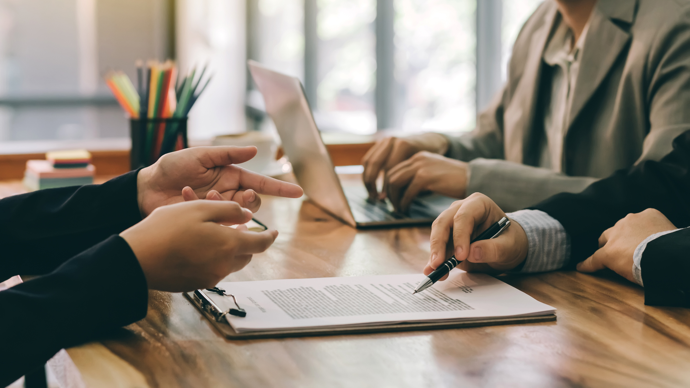 business professionals reviewing documents