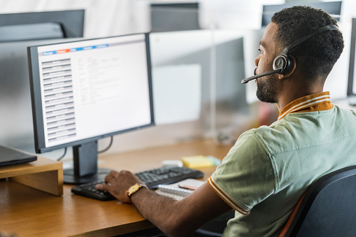 IT support technician helping a customer