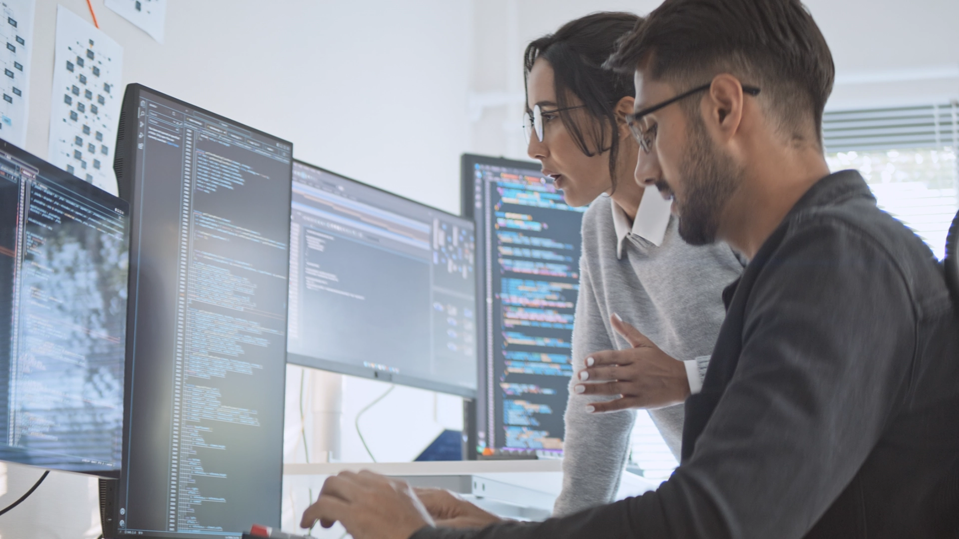 Cybersecurity Specialists Reviewing Security Logs