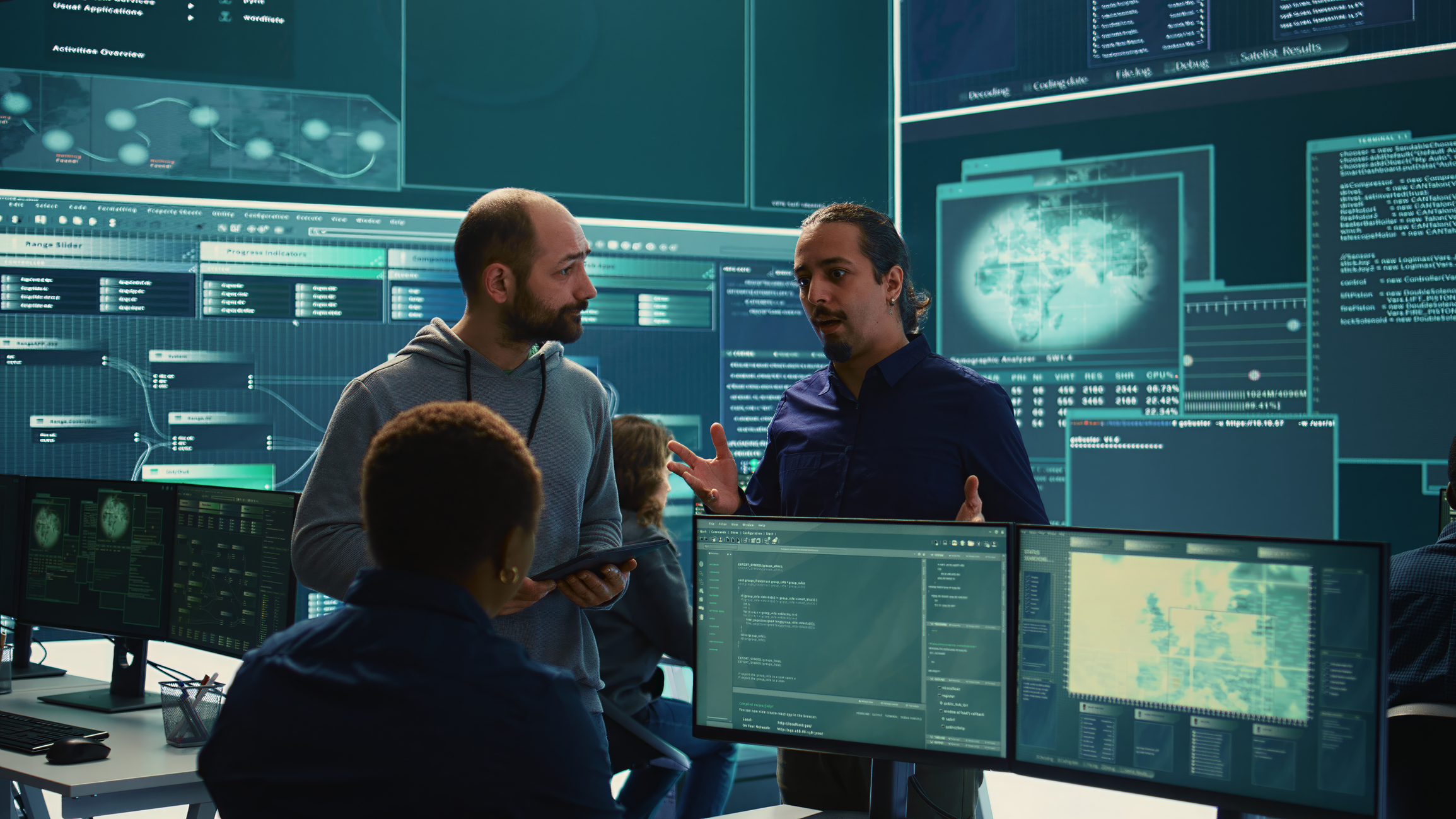 Cybersecurity Technicians Discussing Cyber Threats