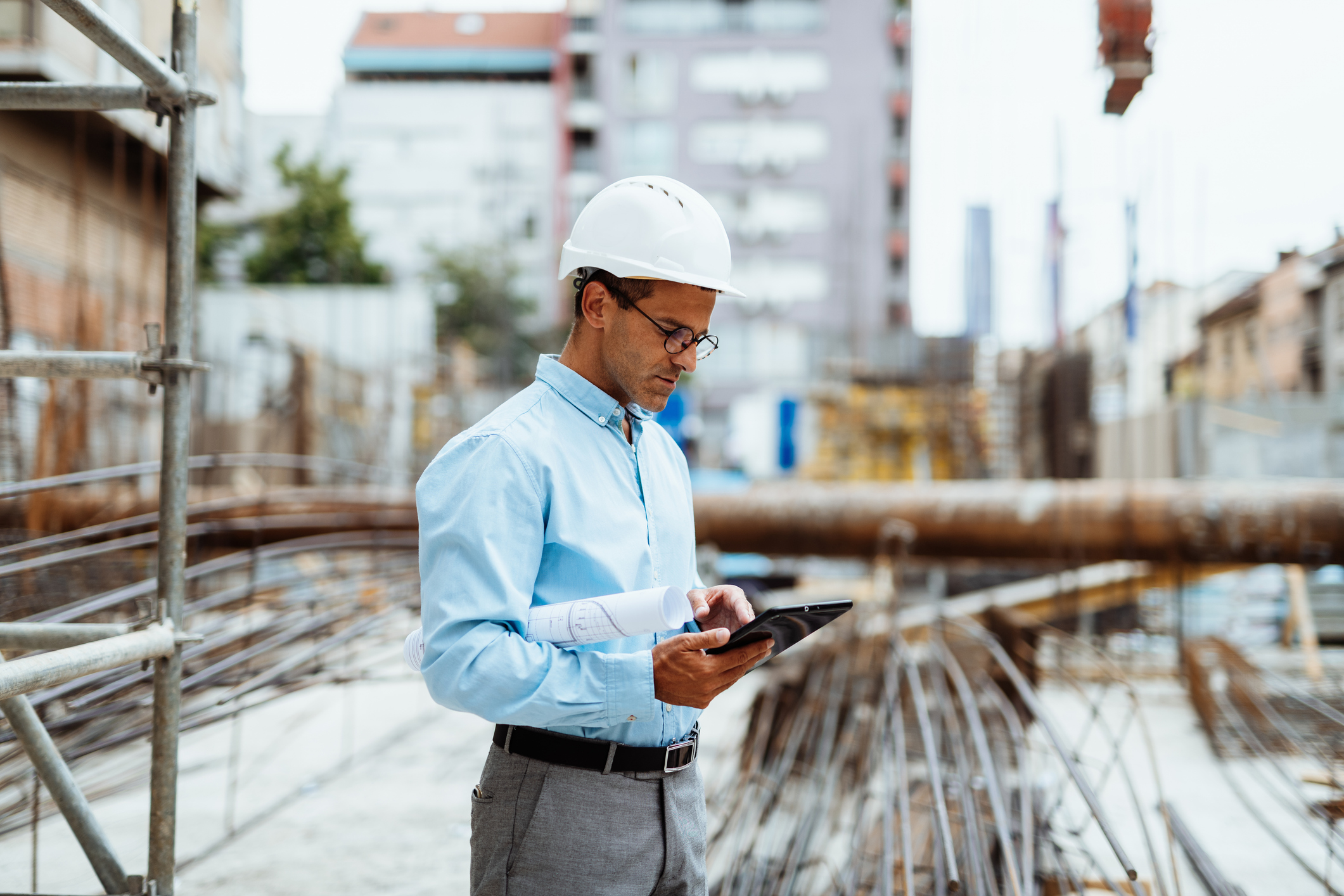 A Project Manager Using a Tablet at a Job Site