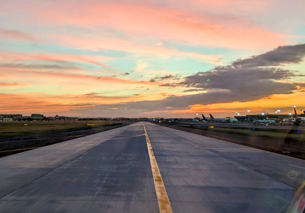 A runway at sunset