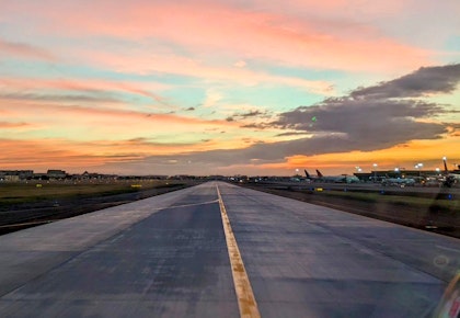 A runway at sunset