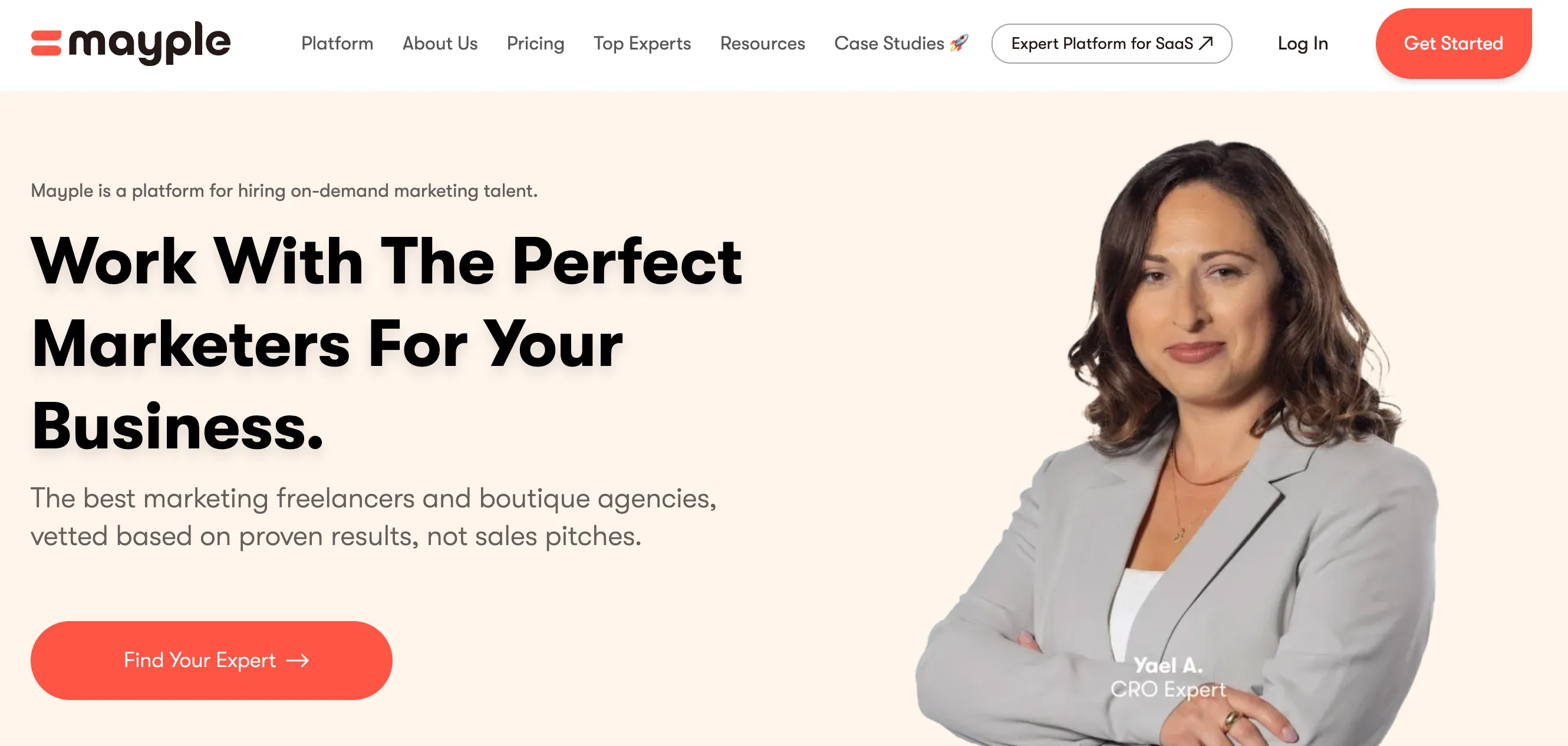 Marketing platform homepage featuring bold messaging, "Work With The Perfect Marketers For Your Business," with a professional expert image and a call-to-action button to find vetted marketing talent for proven results.