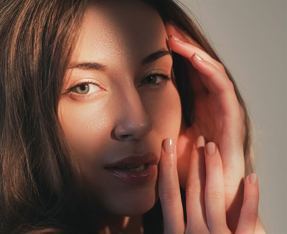 woman posing with face in shadow