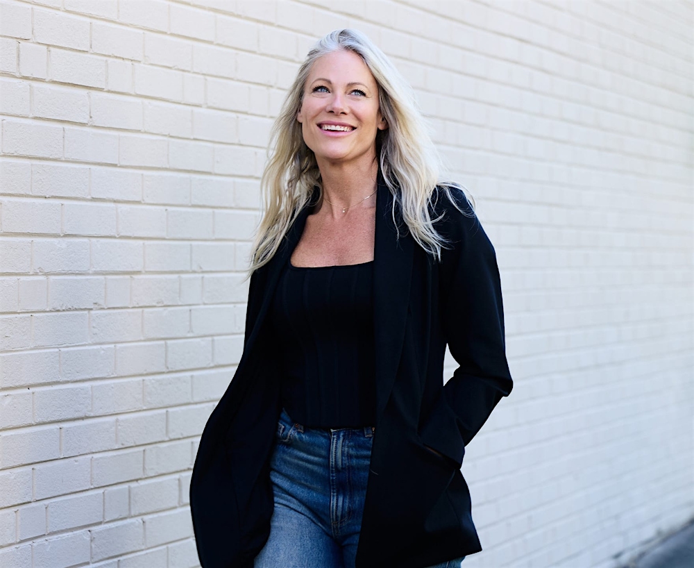 woman smiling and walking