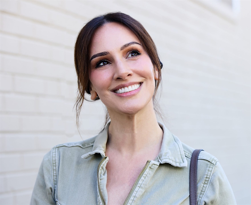 woman smiling outdoors