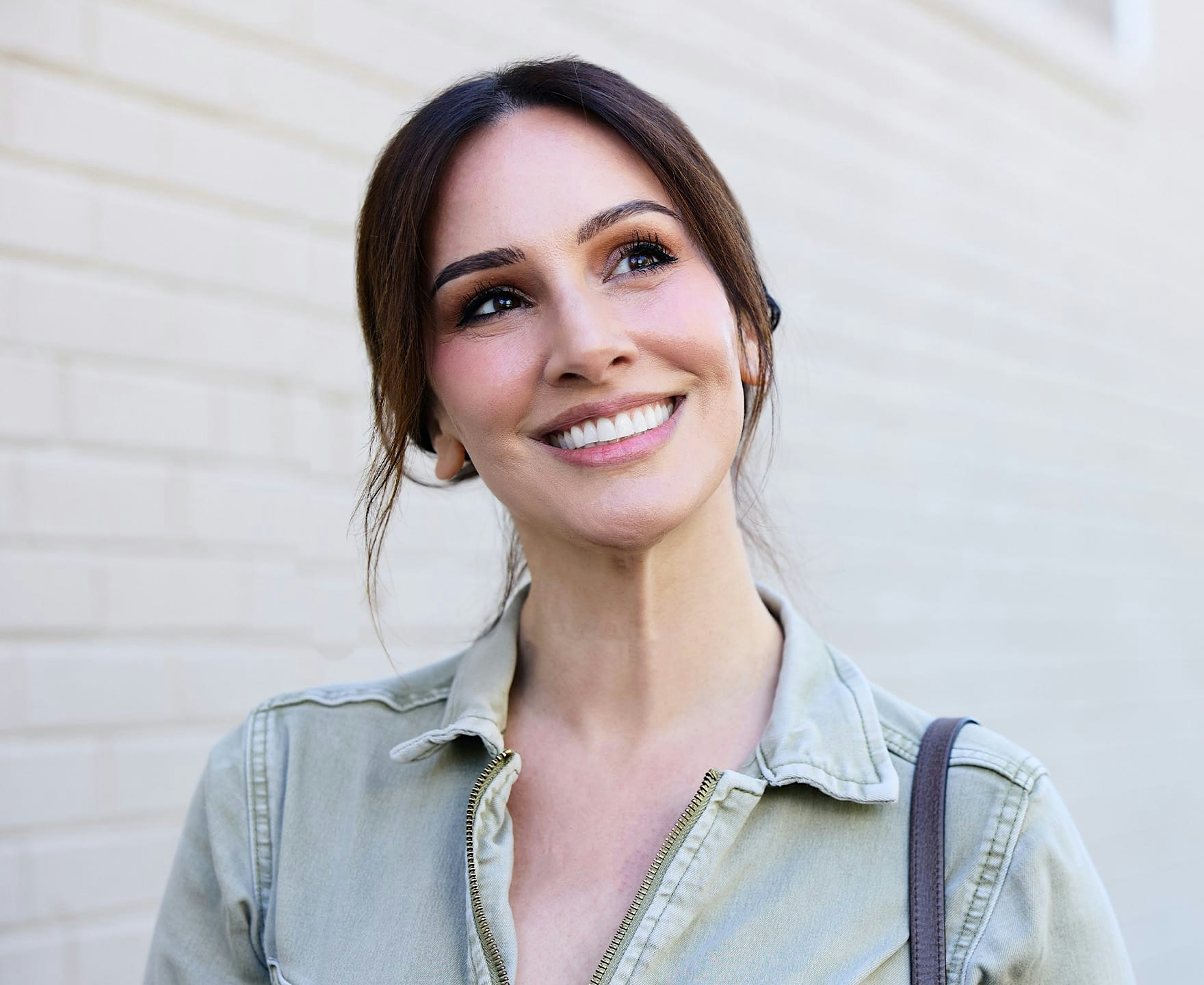 woman smiling outdoors