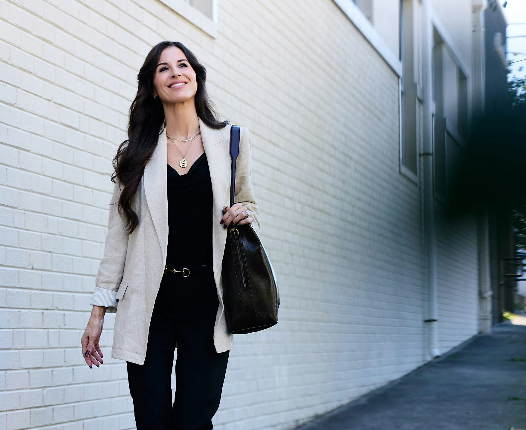 Woman walking and smiling