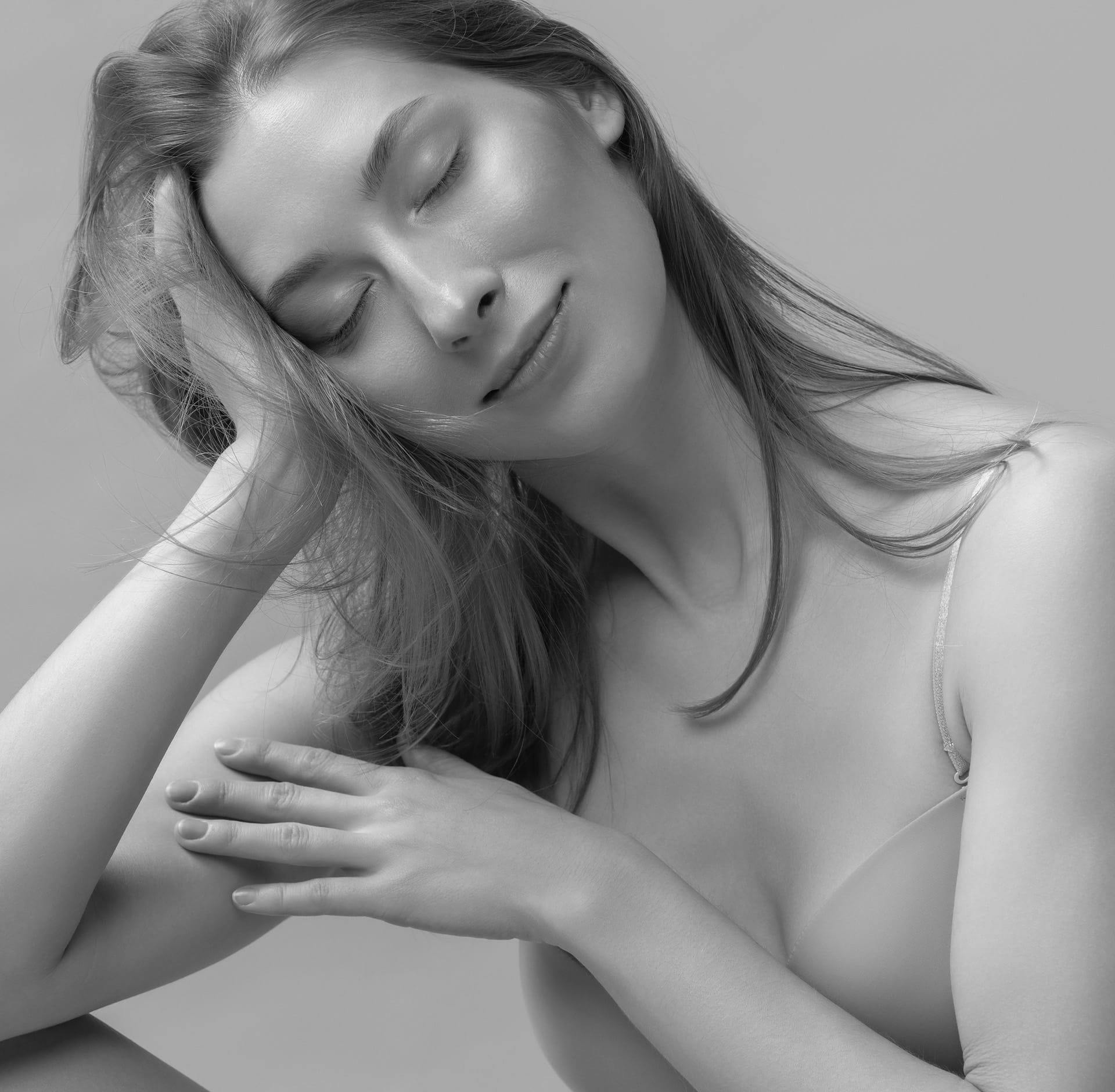 Woman posing with head in hand