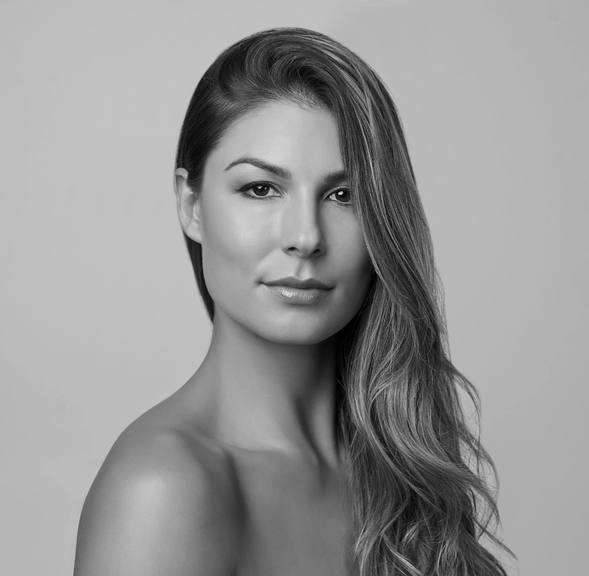 Woman with hair brushed to the side