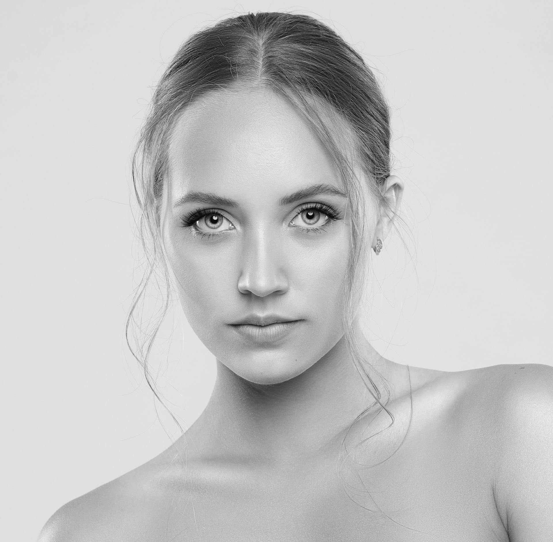 Woman with hair tied back