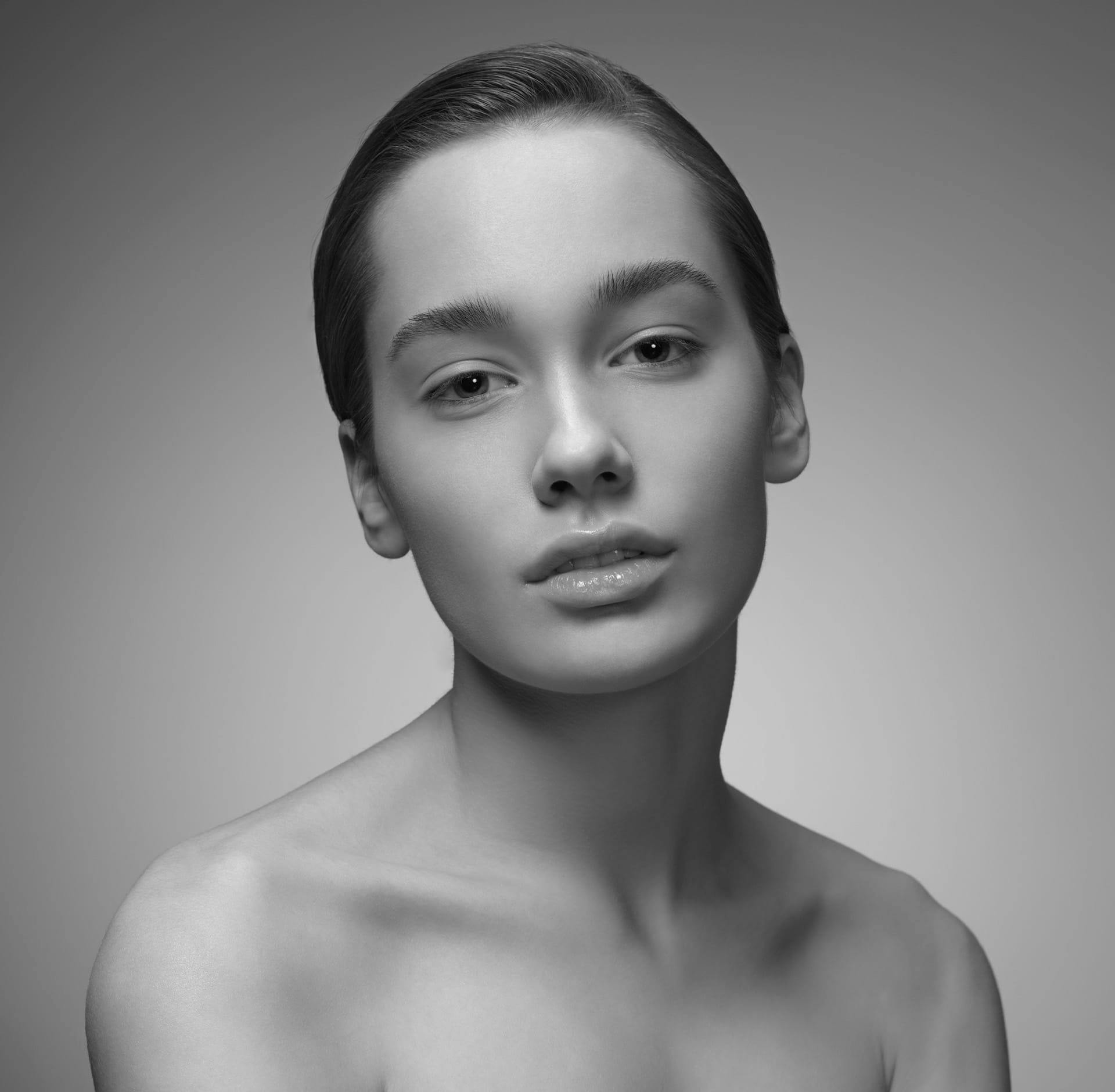 Woman with hair tied back