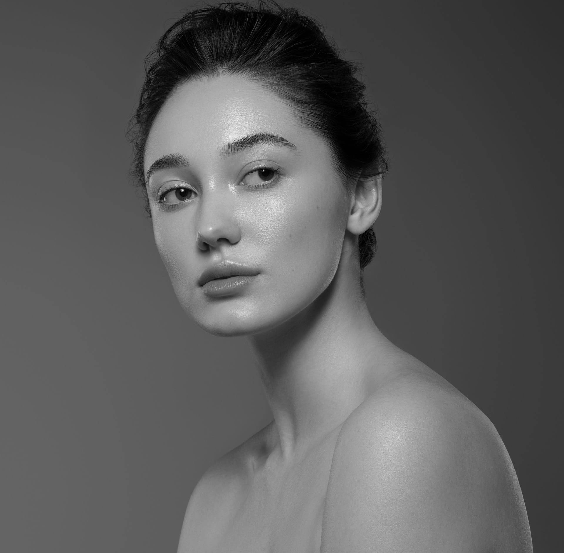 Woman glancing over her shoulder