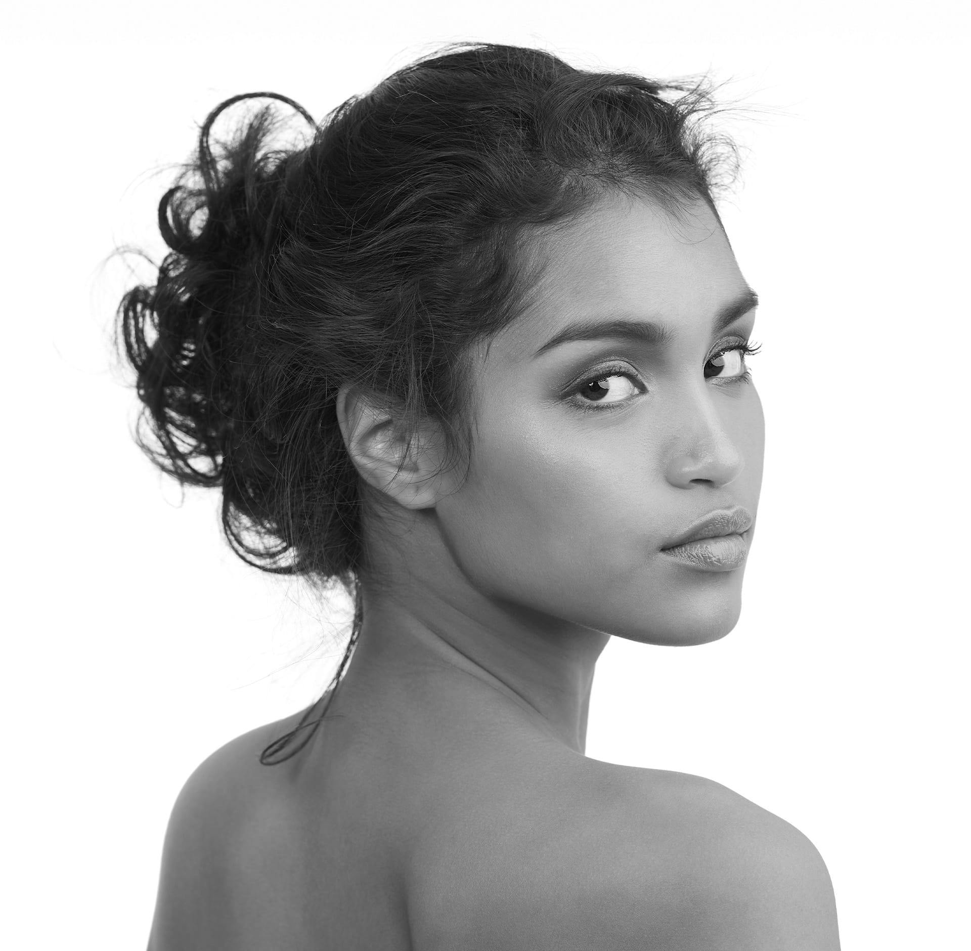 Woman looking back over shoulder