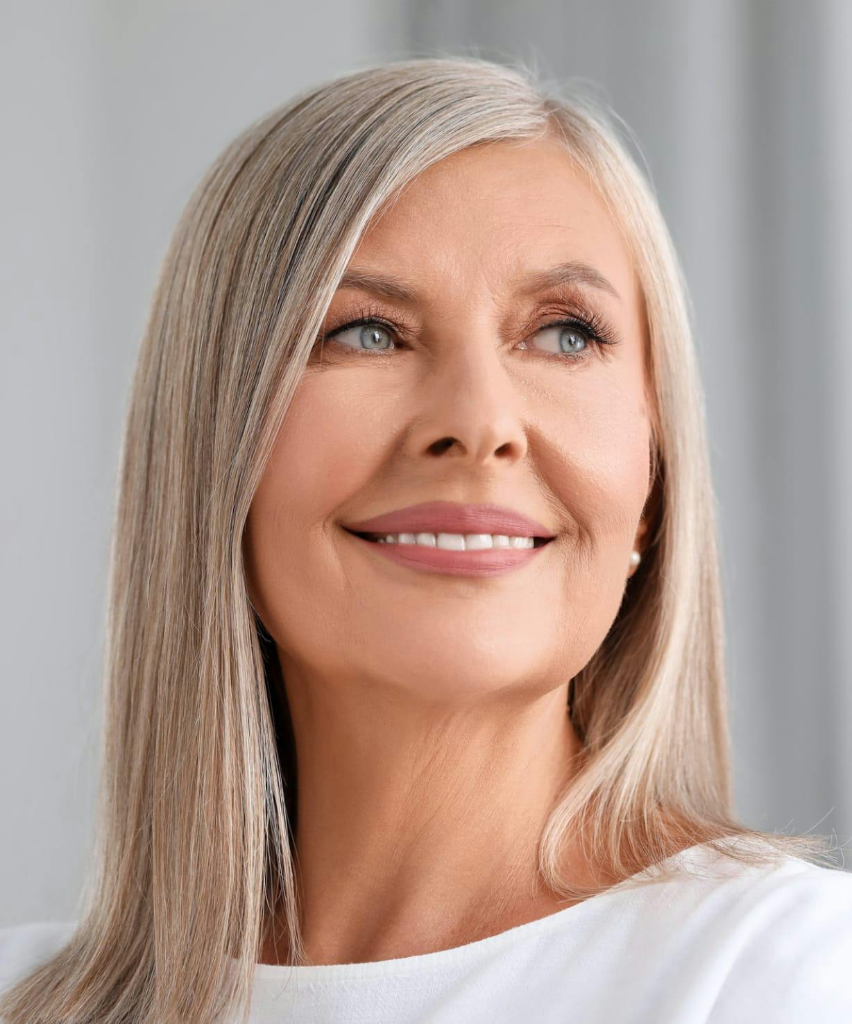 Woman with blond hair, looking to the side