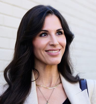 Woman looking to the side and smiling