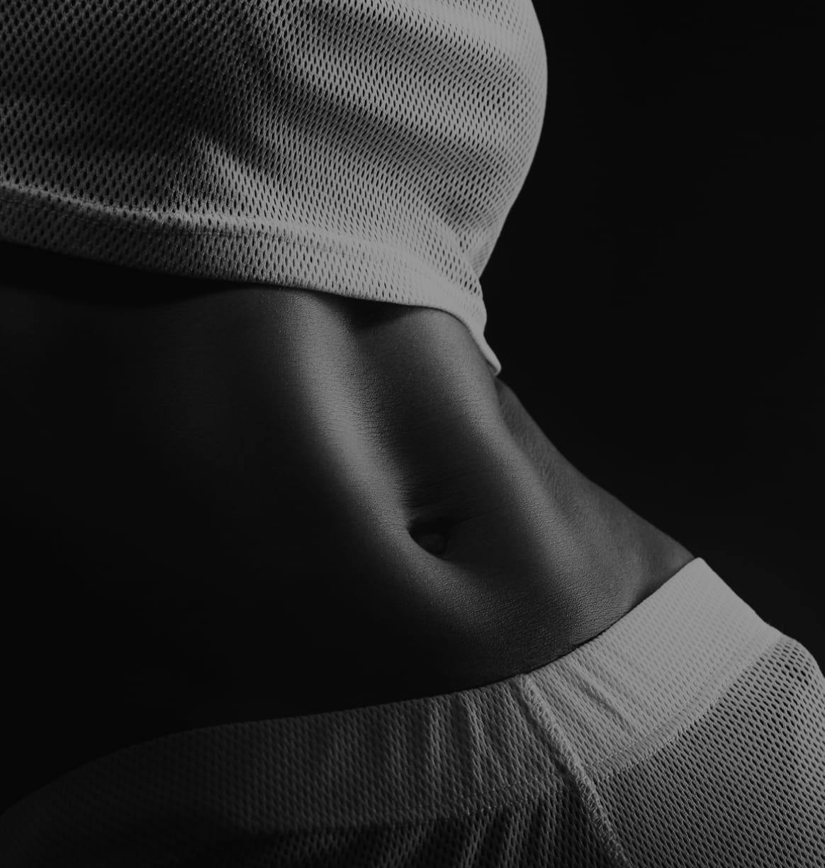 Black and white image of a woman's torso