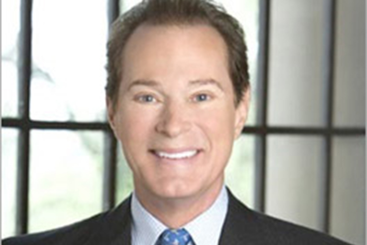 Headshot of Dr. Maxwell smiling at the camera