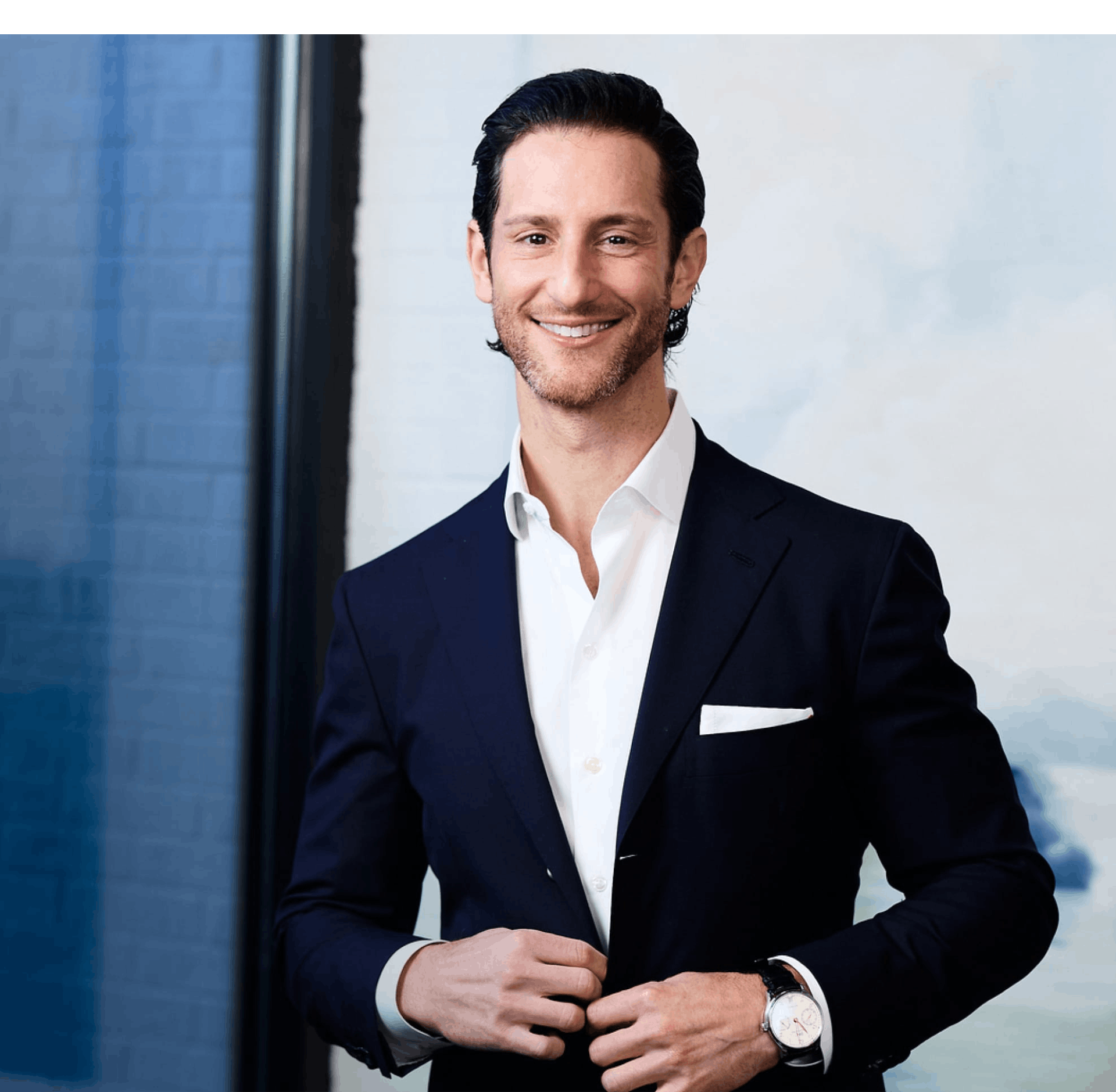 Dr. Jacob Unger in a blue suit