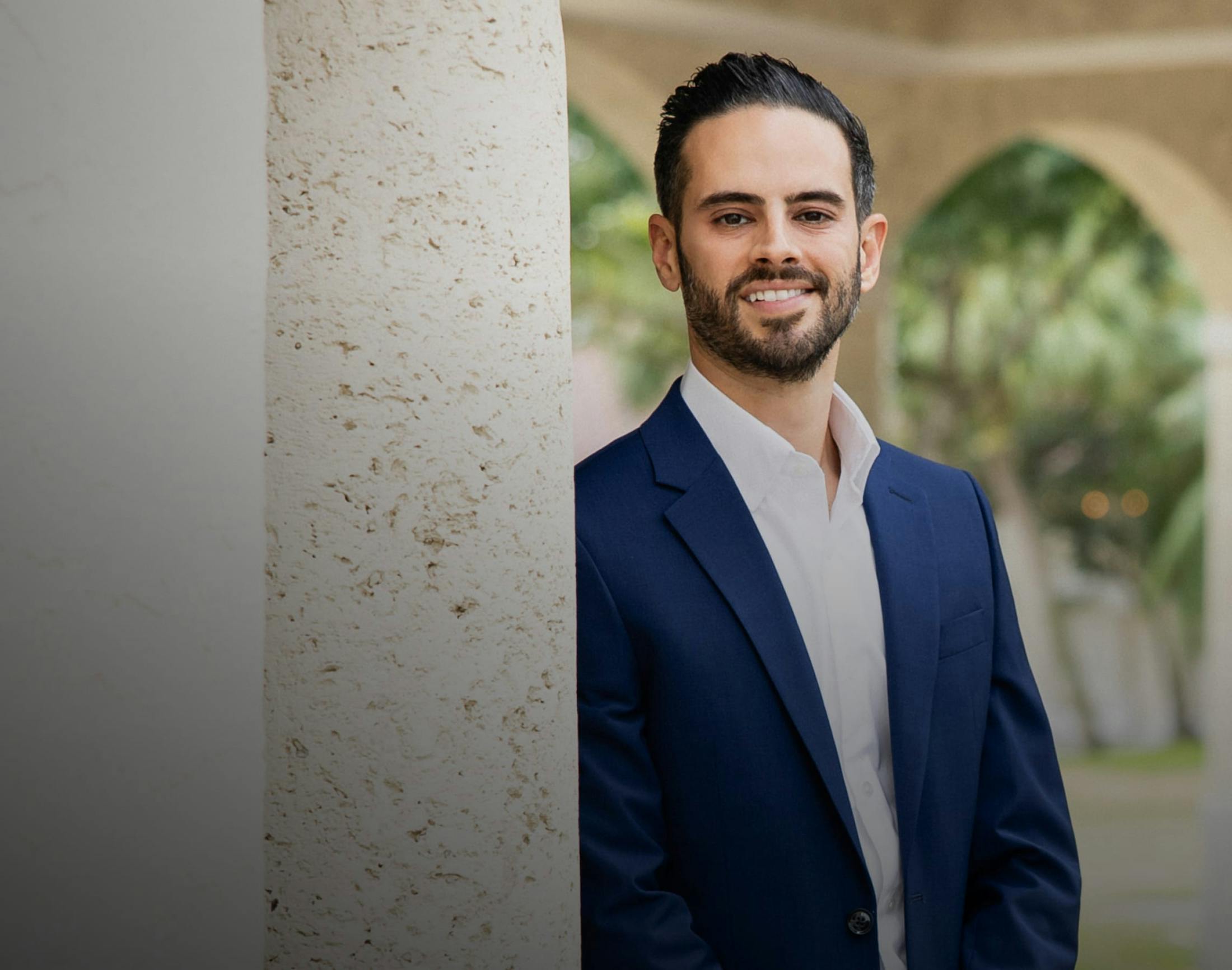 Dr. Nicolas Garcia in suit