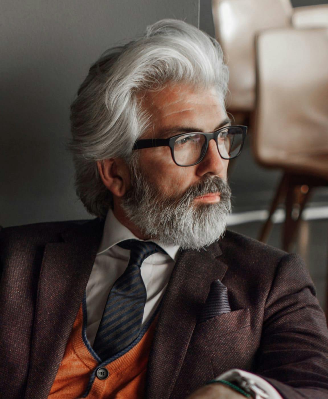 A man with healthy hair after seeing the hair restoration specialists in Delray Beach.