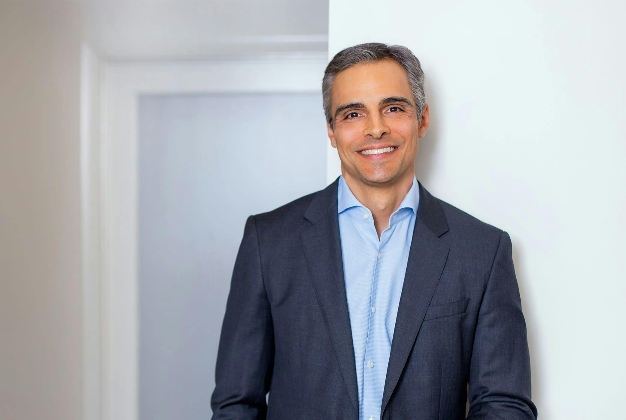 Dr. Anthony Bared in suit